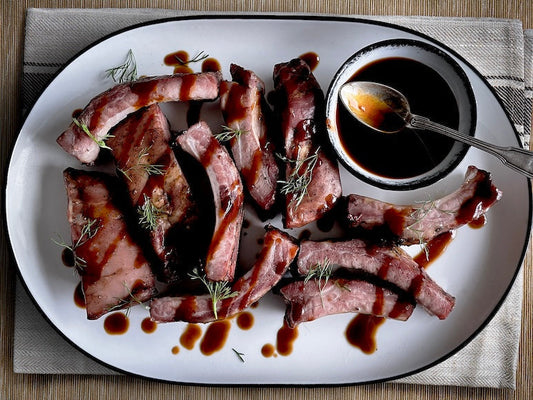 Costilla ahumada con bbq de ron, panela y naranja